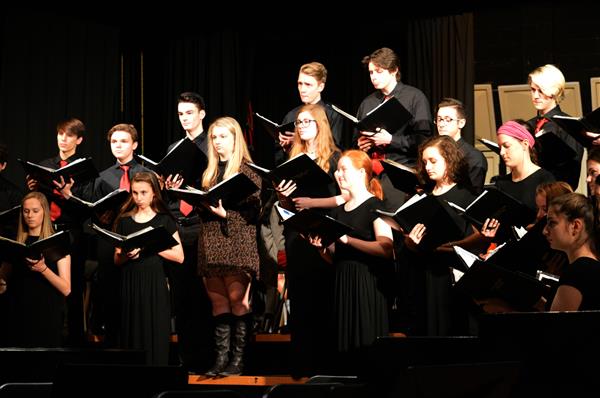 The chamber choir performs. 